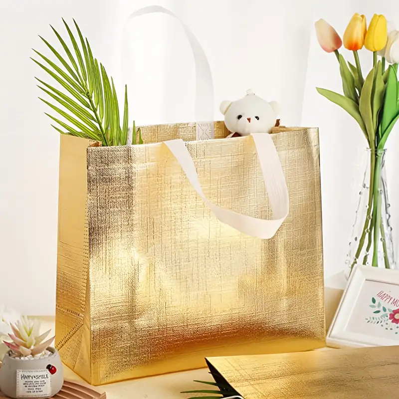 4pcs Non Woven Laser Gift Bag For Gift Giving Party Clothing